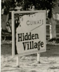 Click to enlarge photo Hidden Village Sign